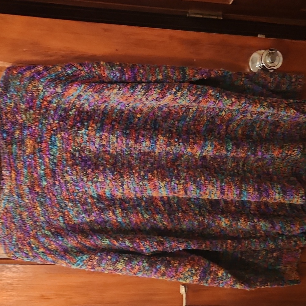 Cute multi colored sweater very pretty worn a hand full.of times so comfy